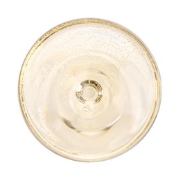 Photo of Champagne in glass isolated on white, top view