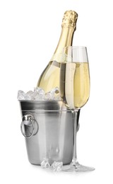 Photo of Champagne and bucket with ice isolated on white