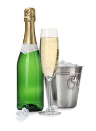 Photo of Champagne and bucket with ice isolated on white