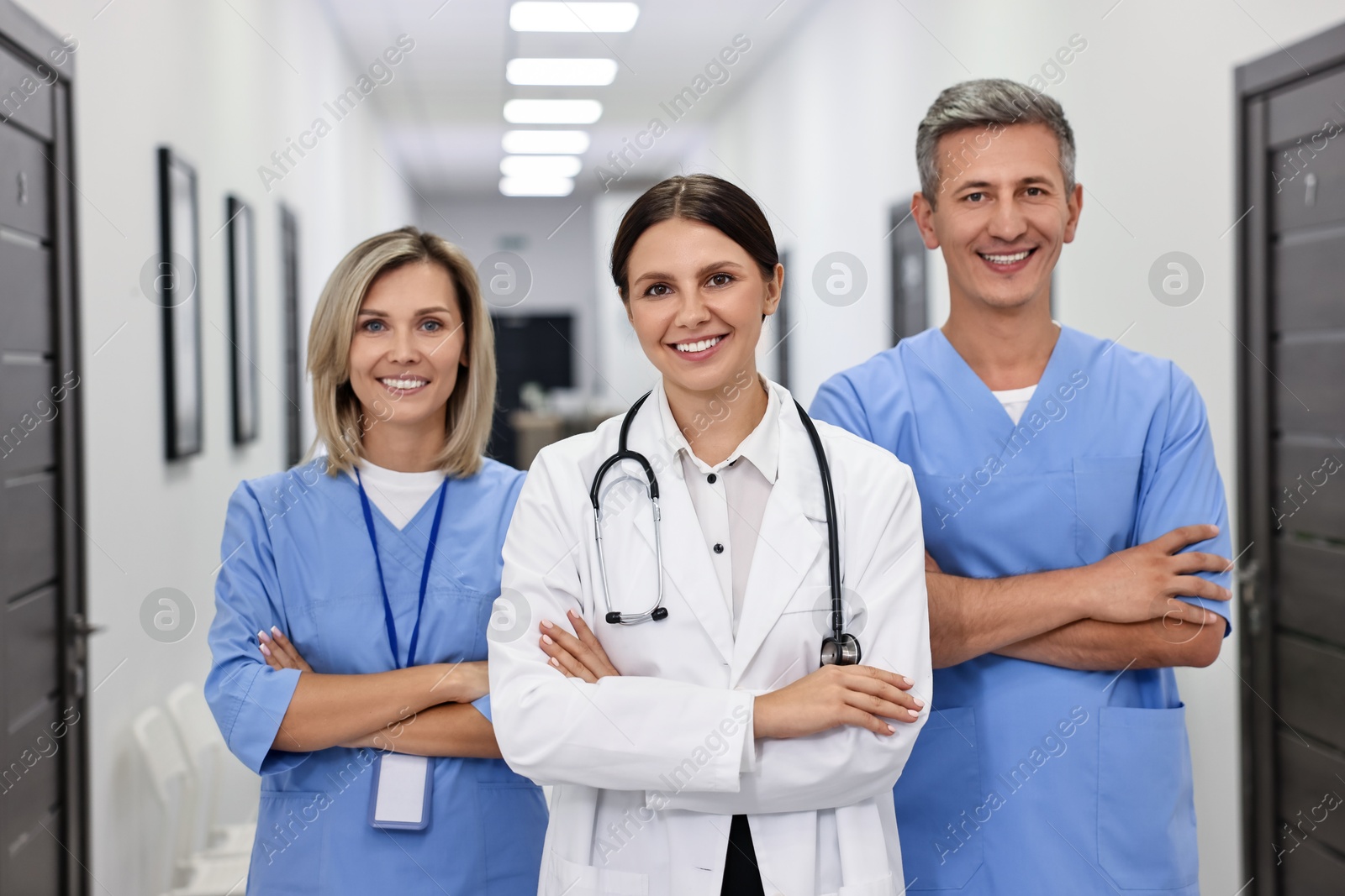 Photo of Portrait of smiling healthcare workers in hospital