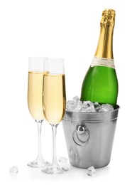 Photo of Champagne and bucket with ice isolated on white