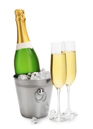 Photo of Champagne and bucket with ice isolated on white