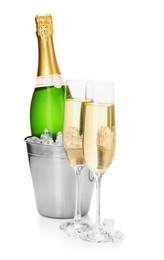 Photo of Champagne and bucket with ice isolated on white