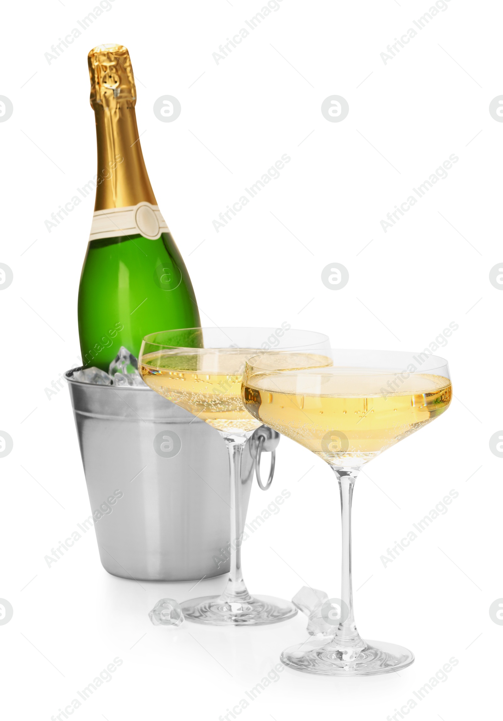 Photo of Champagne and bucket with ice isolated on white