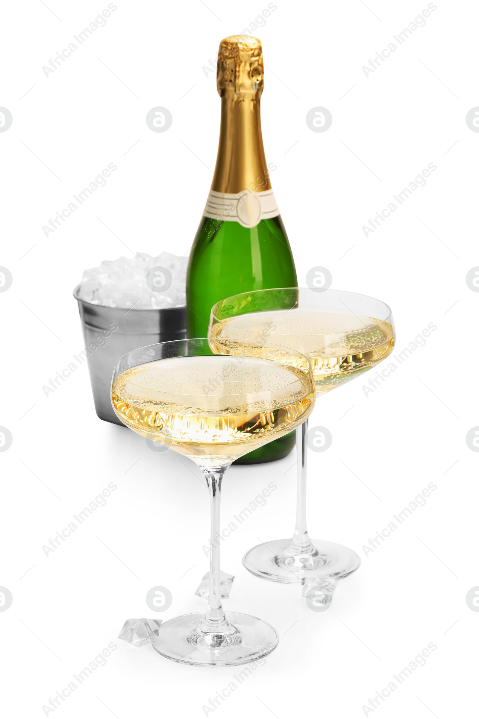 Photo of Champagne and bucket with ice isolated on white