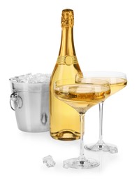 Photo of Champagne and bucket with ice isolated on white