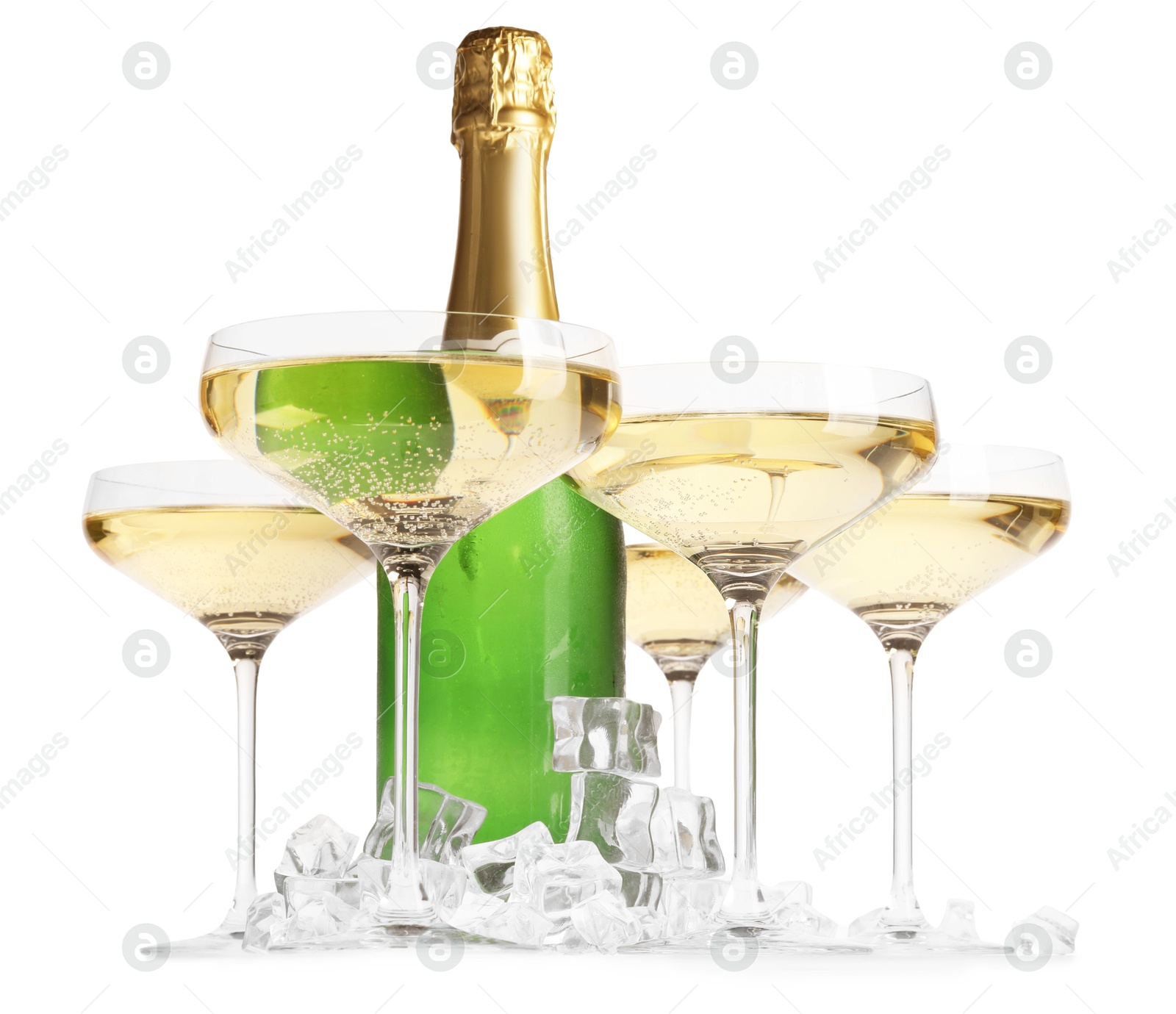 Photo of Bottle and glasses of champagne with ice cubes isolated on white