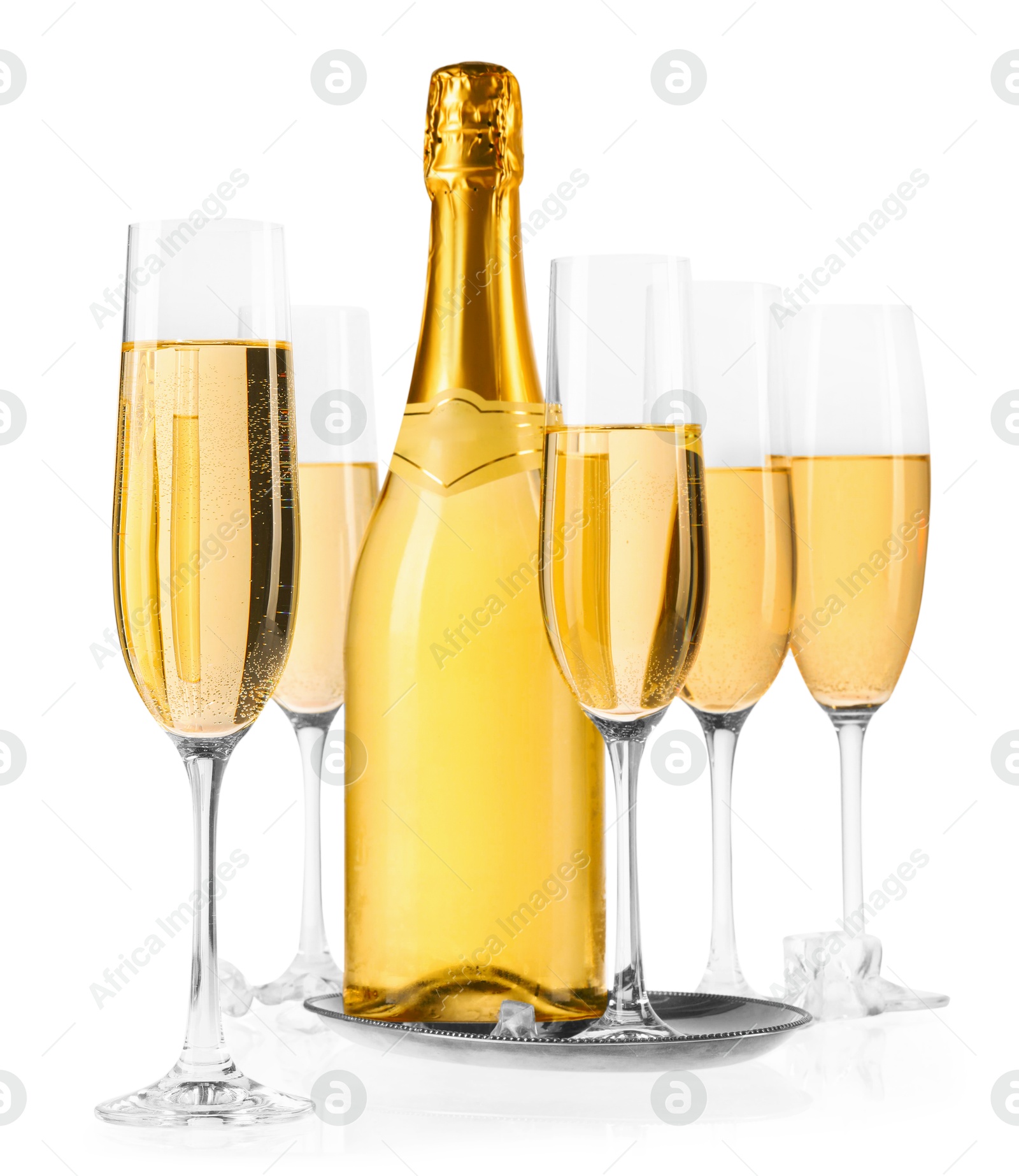 Photo of Bottle and glasses of champagne with ice cubes isolated on white