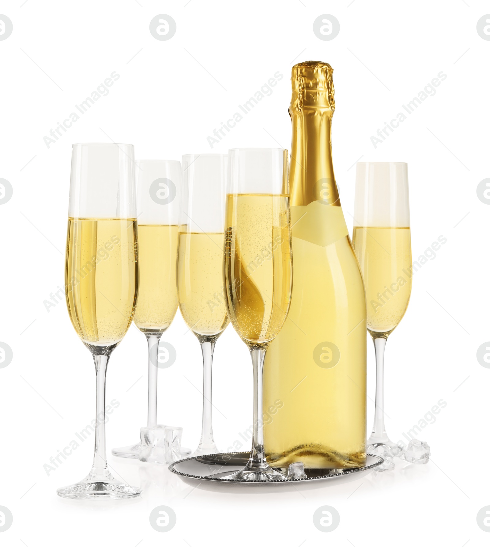 Photo of Bottle and glasses of champagne with ice cubes isolated on white