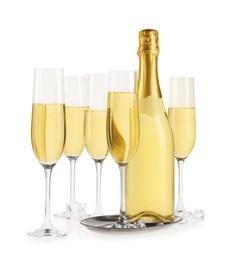 Photo of Bottle and glasses of champagne with ice cubes isolated on white