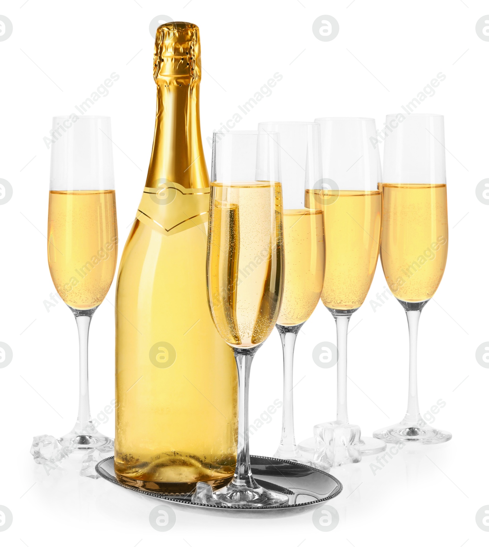 Photo of Bottle and glasses of champagne with ice cubes isolated on white