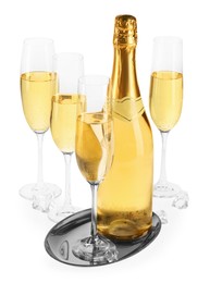 Photo of Bottle and glasses of champagne with ice cubes isolated on white