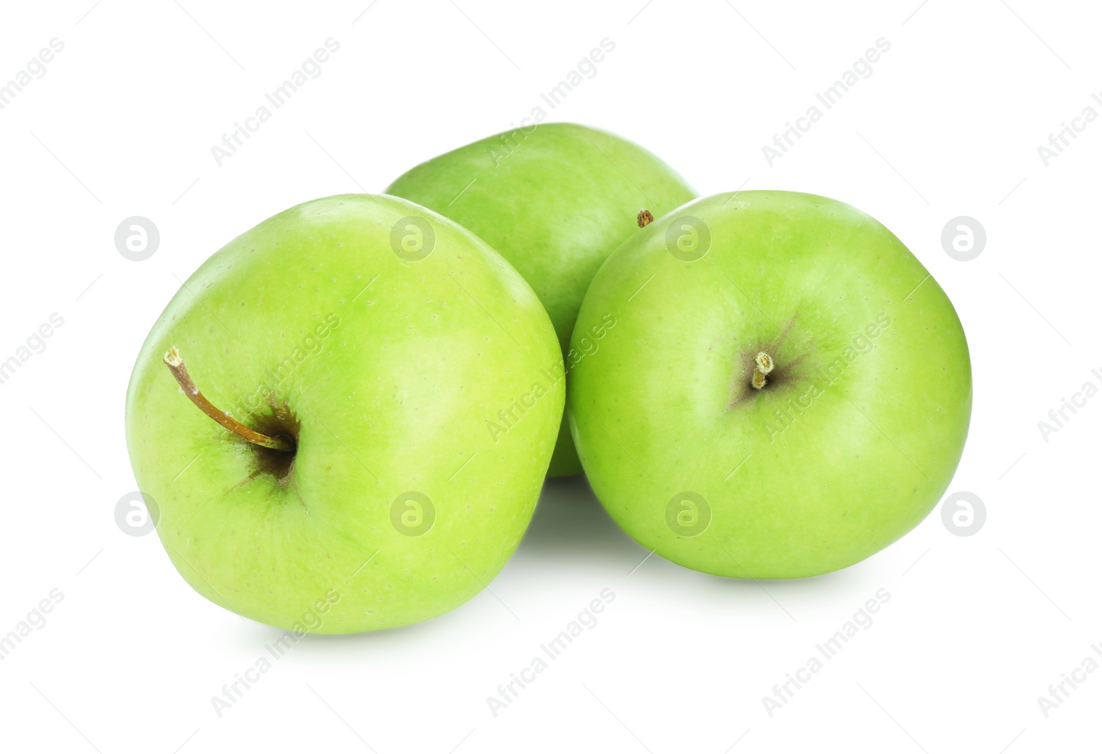 Photo of Three fresh green apples isolated on white