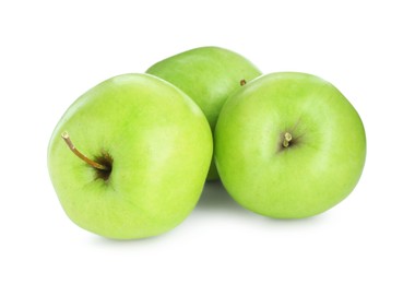 Photo of Three fresh green apples isolated on white