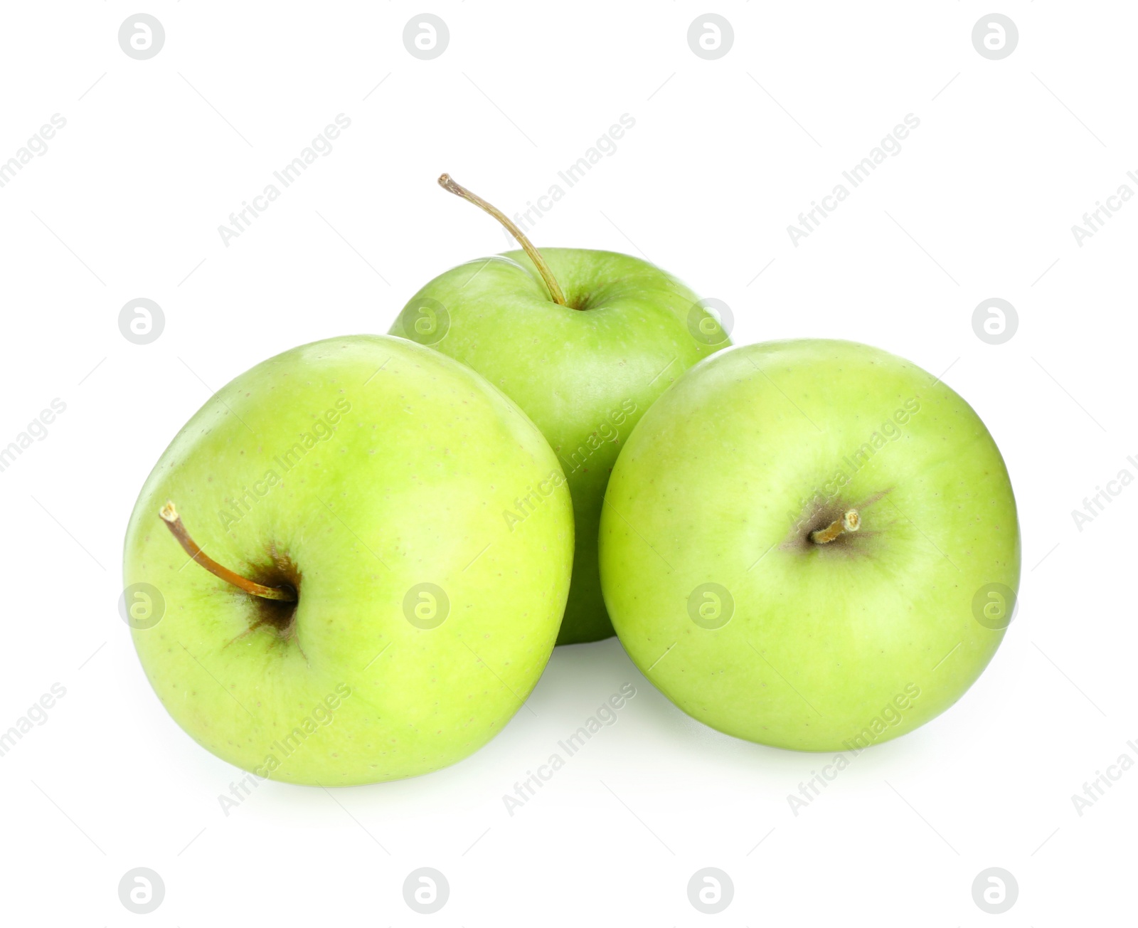 Photo of Three fresh green apples isolated on white