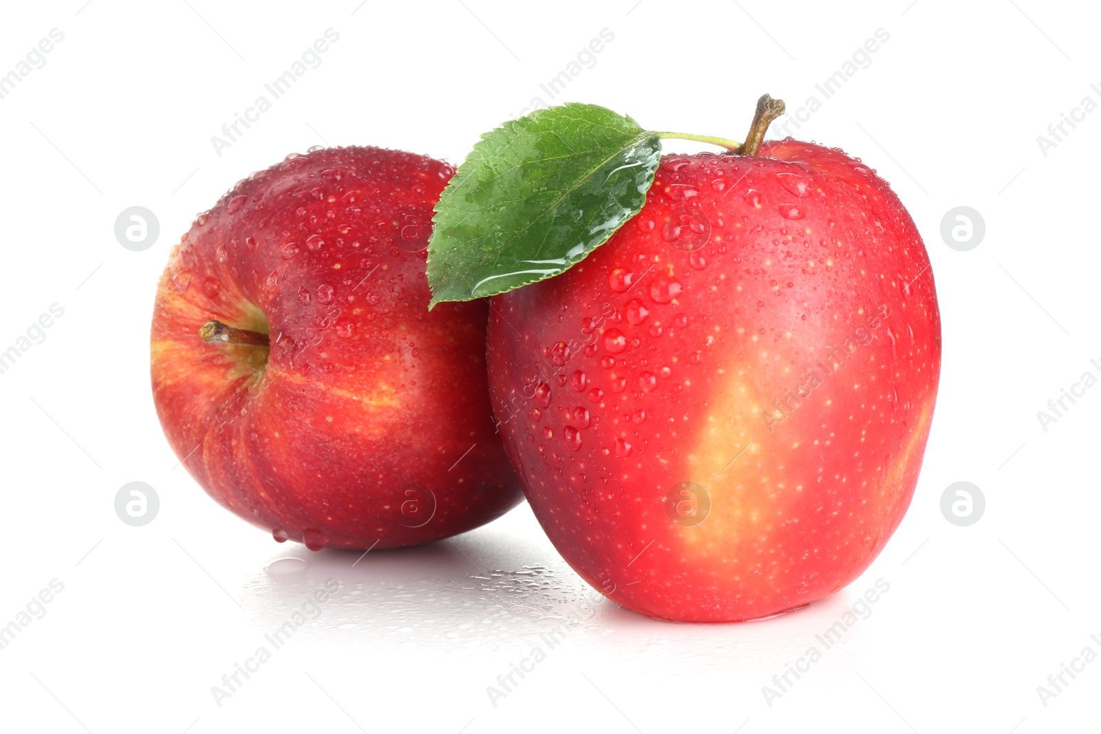 Photo of Two fresh red apples isolated on white