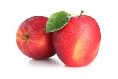 Photo of Two fresh red apples isolated on white