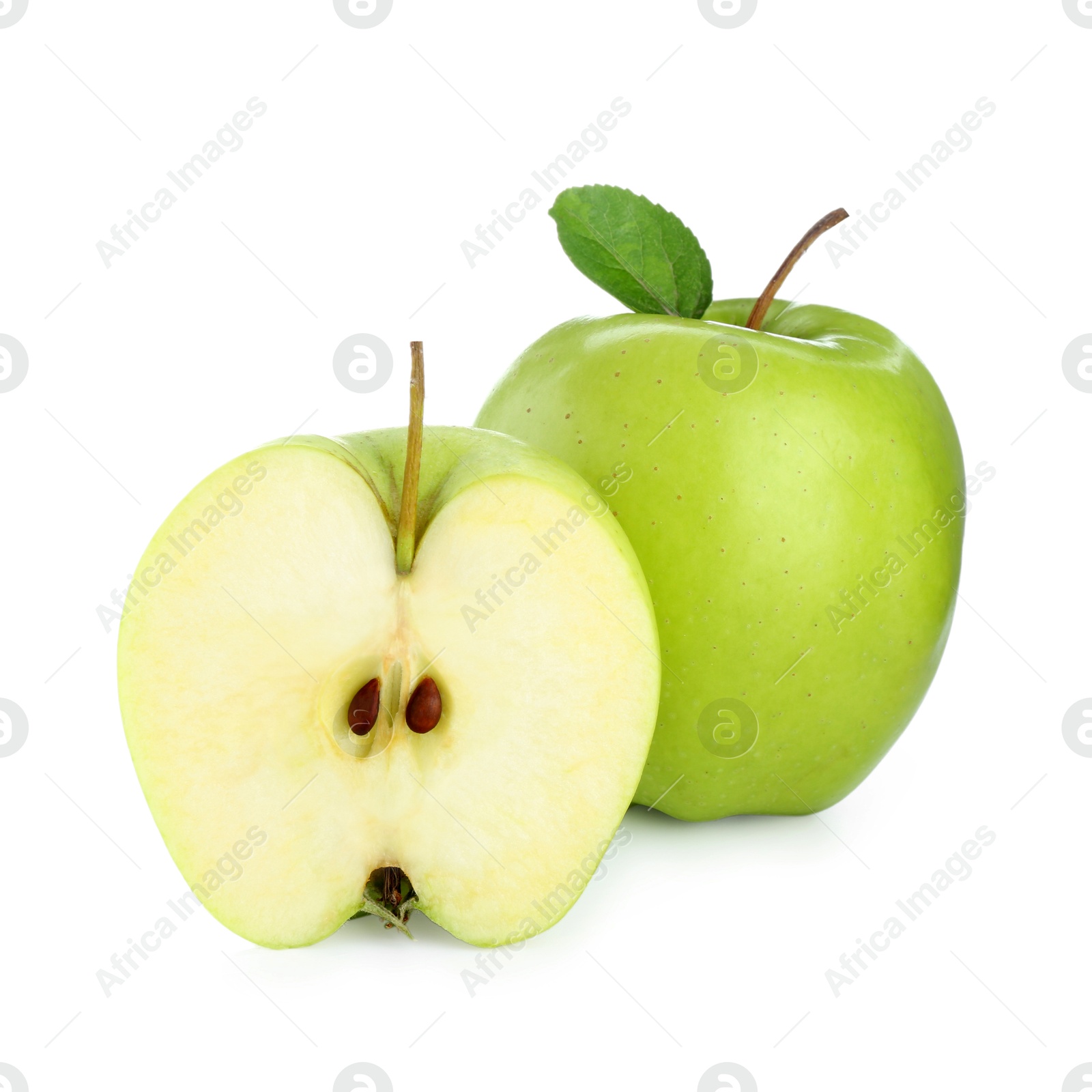 Photo of Whole and cut fresh green apples isolated on white