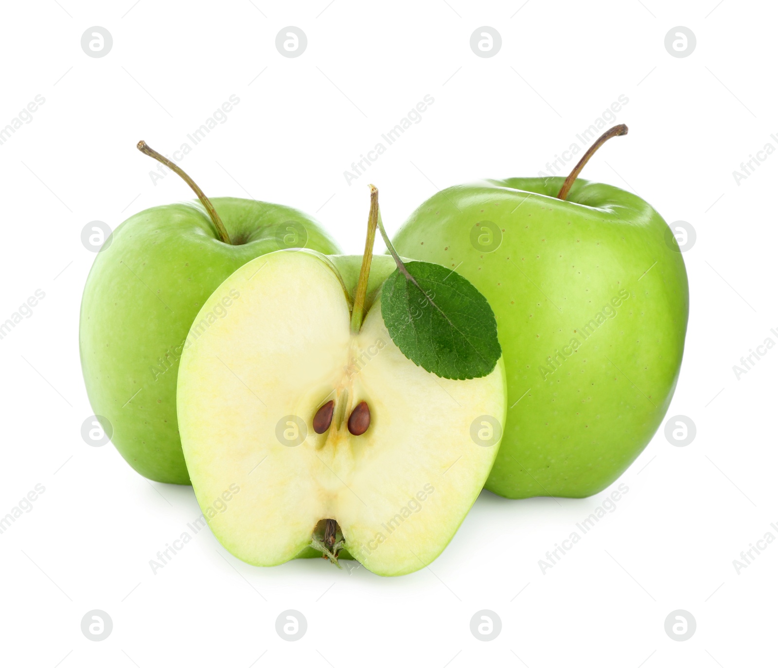 Photo of Whole and cut fresh green apples isolated on white