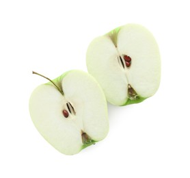 Photo of Halves of green apple isolated on white, top view