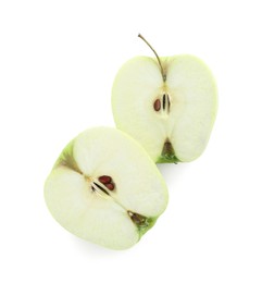 Photo of Halves of green apple isolated on white, top view