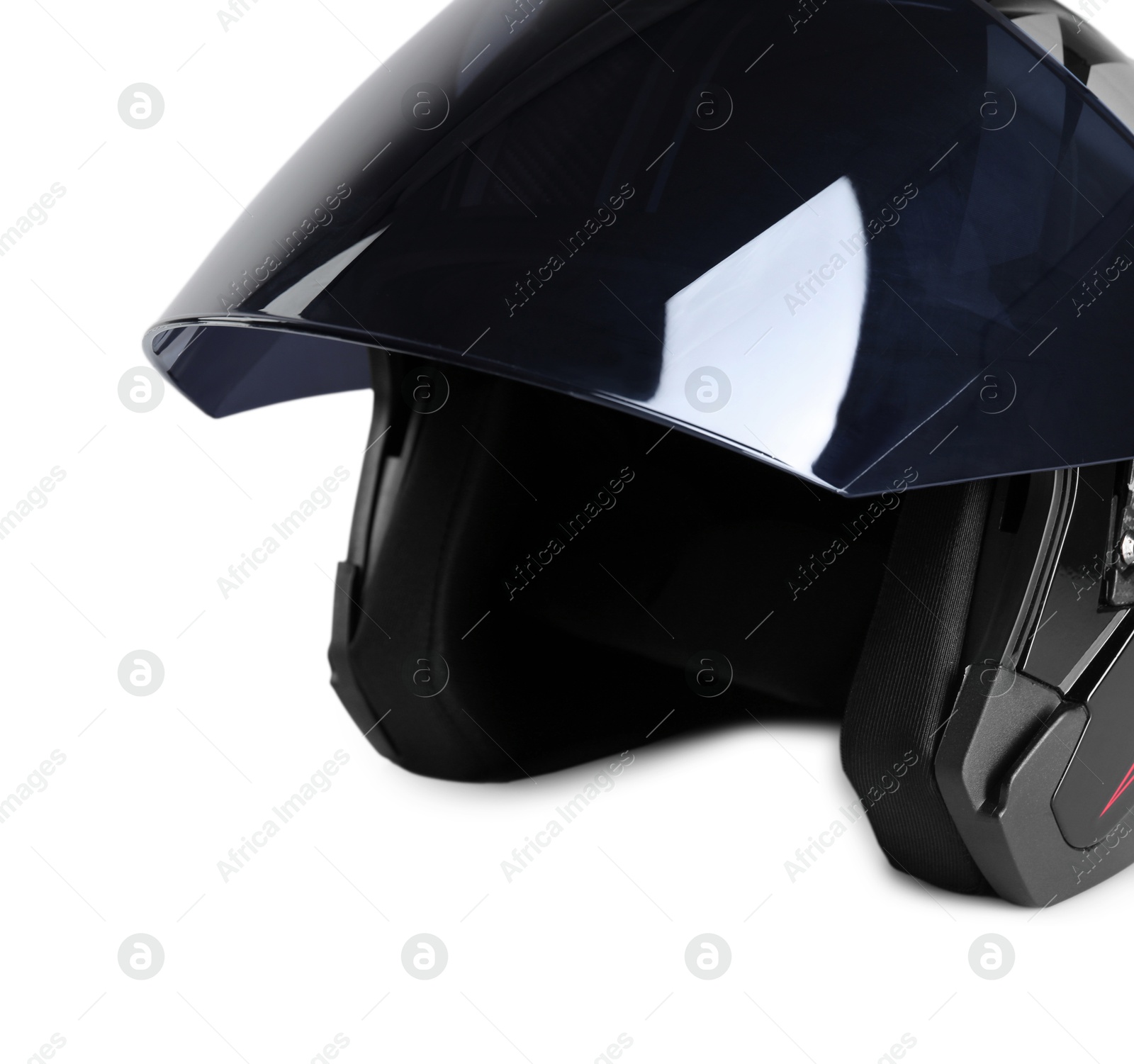 Photo of Modern motorcycle helmet with visor on light background, closeup