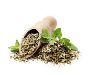 Photo of Dried oregano, green leaves and wooden scoop isolated on white