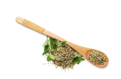 Photo of Dried oregano, green leaves and wooden spoon isolated on white, top view