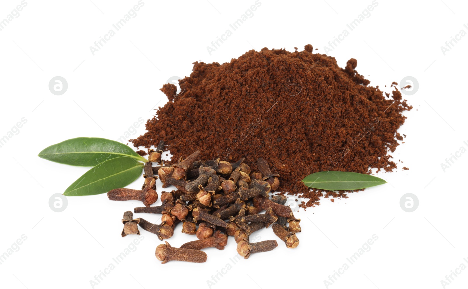 Photo of Pile of clove powder, dried buds and green leaves on white background. Aromatic spice