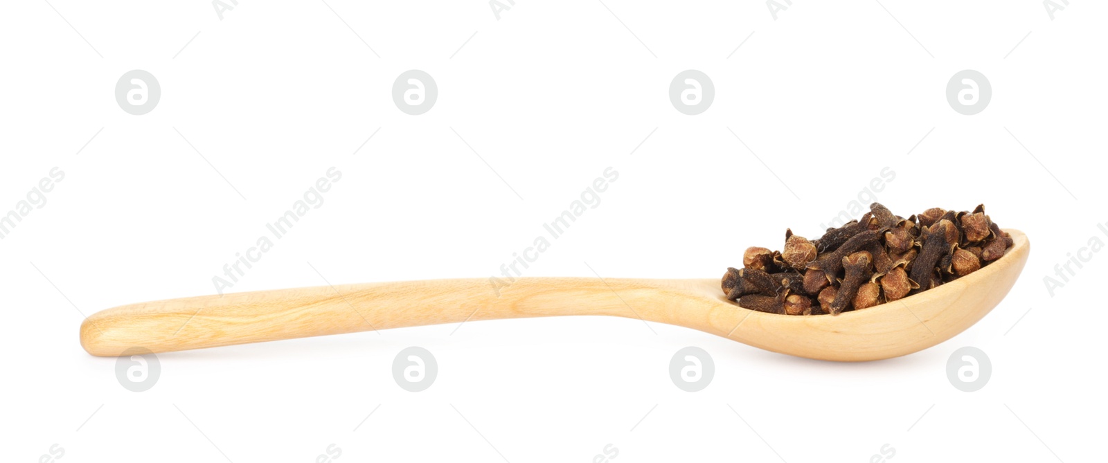 Photo of Dry clove buds in wooden spoon on white background. Aromatic spice