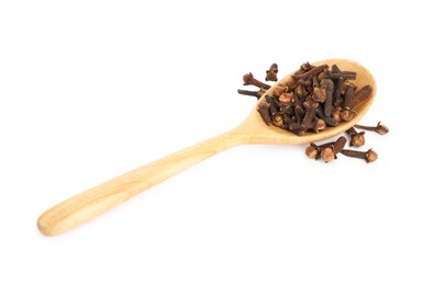 Dry clove buds in wooden spoon on white background. Aromatic spice