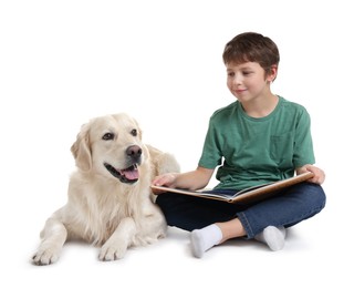 Photo of Boy reading book with his cute dog on white background