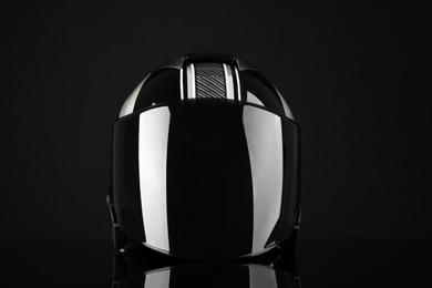 Photo of Motorcycle helmet with visor on black background