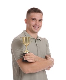 Photo of Happy winner with golden trophy cup on white background