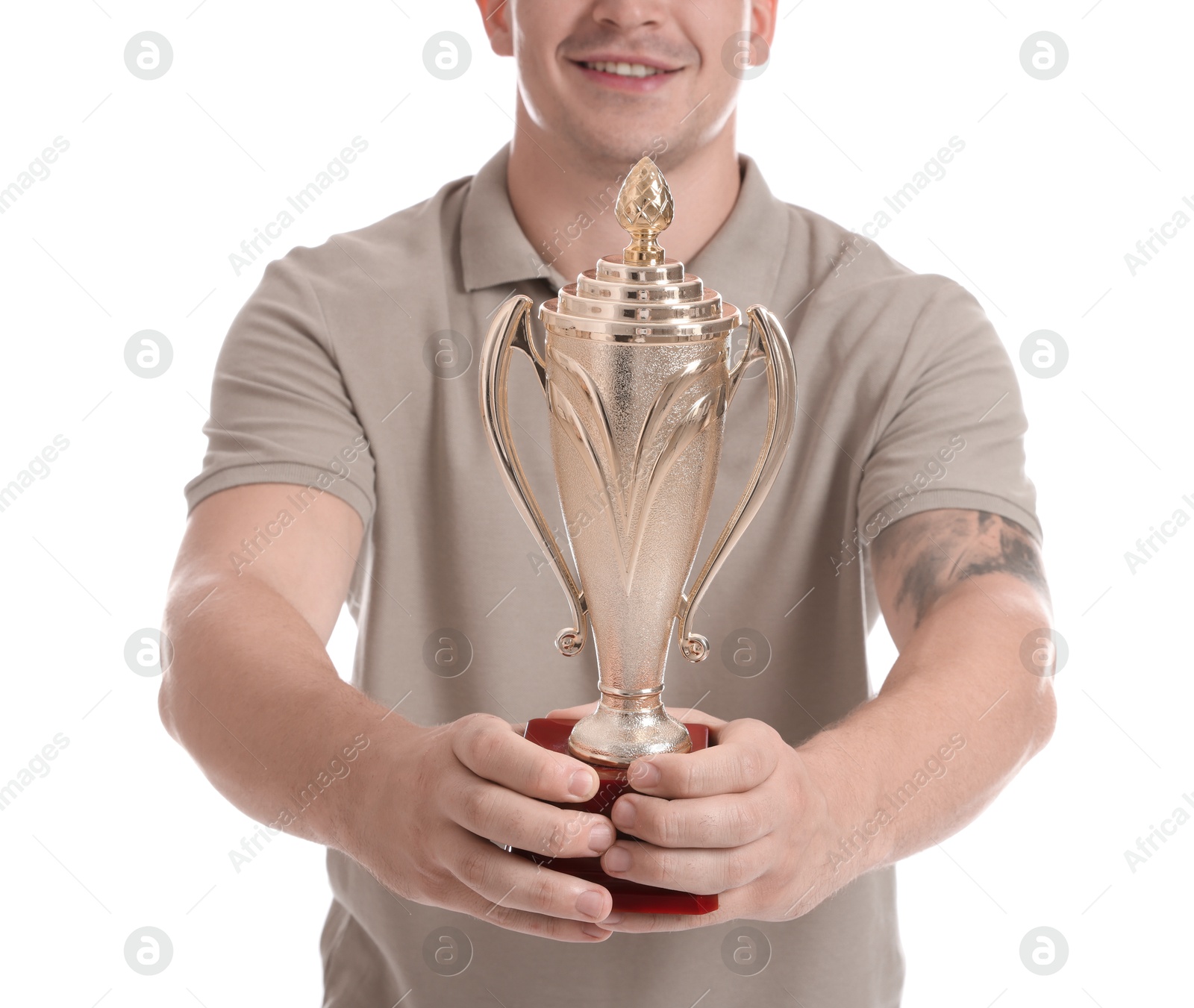 Photo of Winner with golden trophy cup on white background, closeup