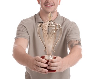 Photo of Winner with golden trophy cup on white background, closeup