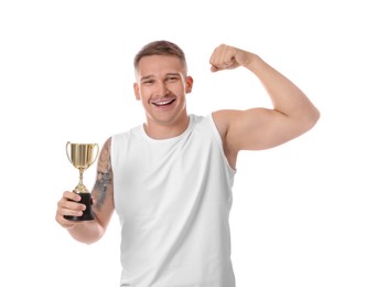 Photo of Happy winner with golden trophy cup showing his bicep on white background