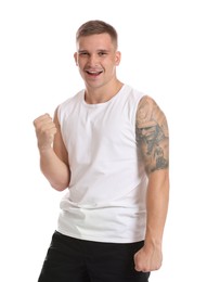 Photo of Portrait of happy winner on white background