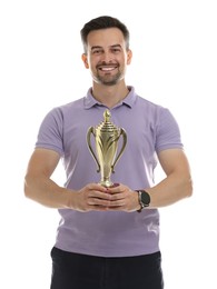 Happy winner with golden trophy cup on white background