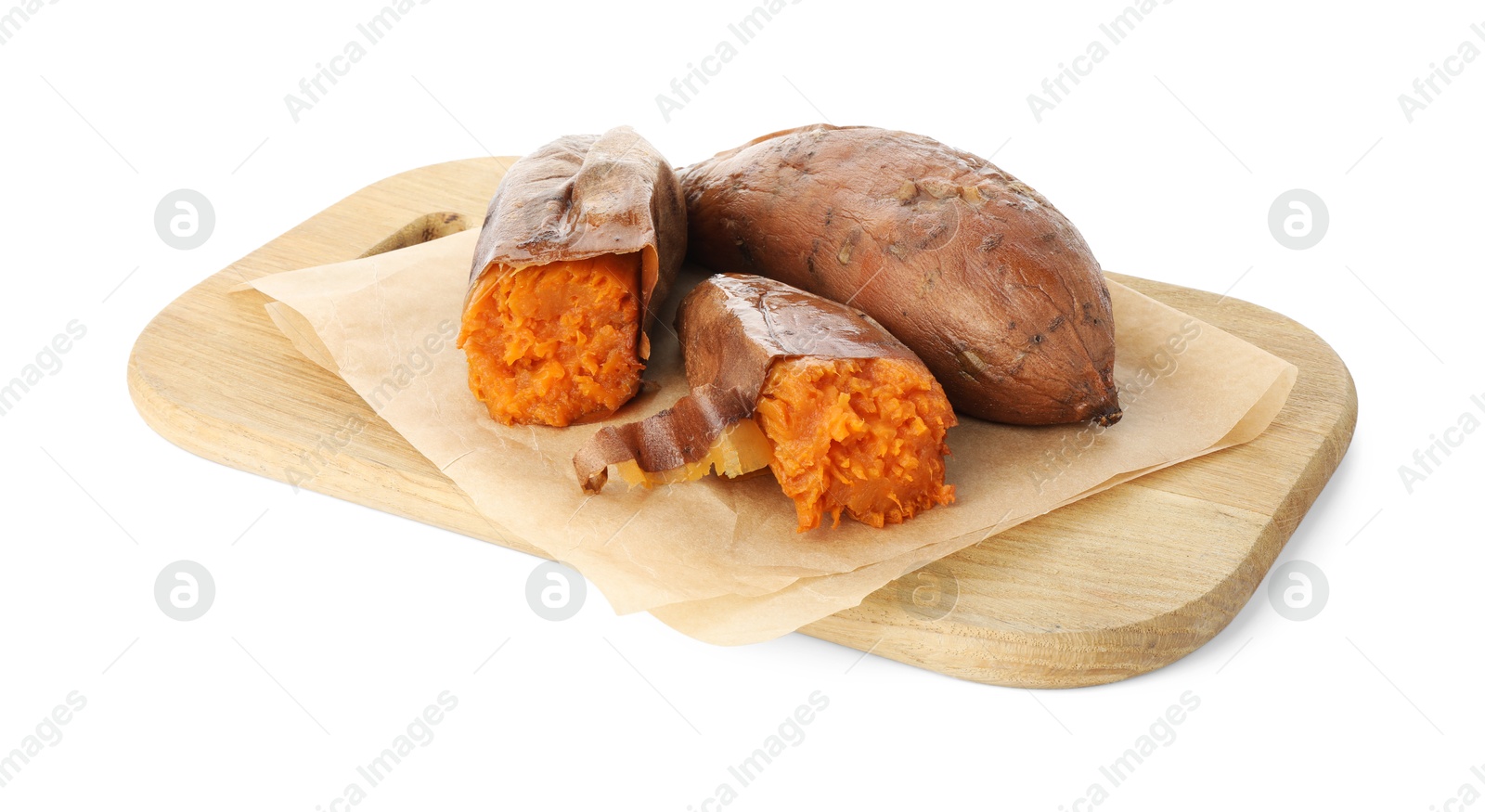 Photo of Tasty cooked sweet potatoes and wooden board isolated on white