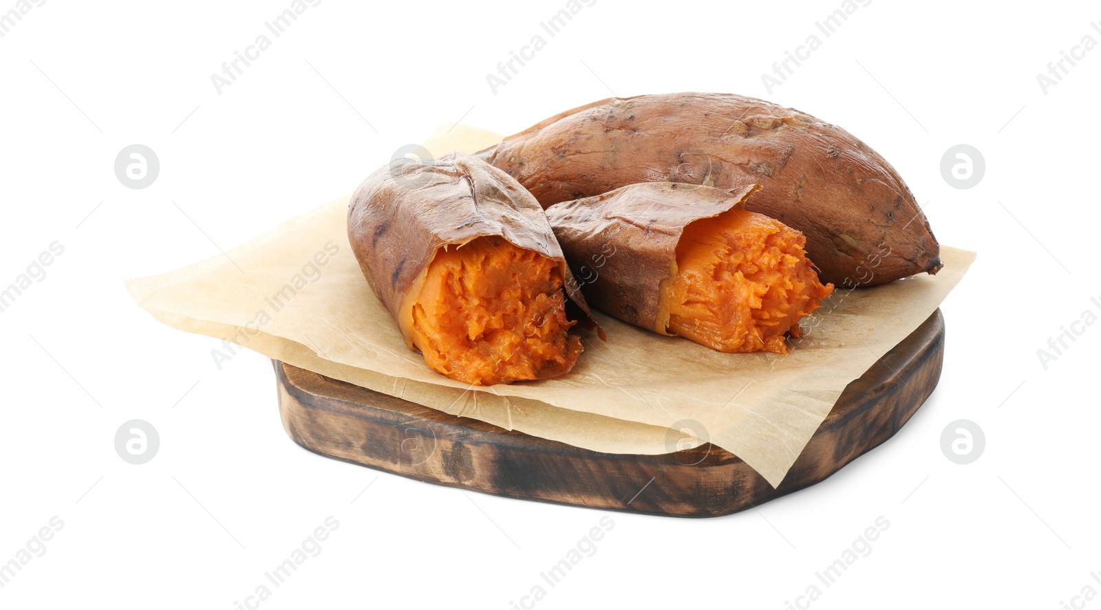 Photo of Tasty cooked sweet potatoes and wooden board isolated on white