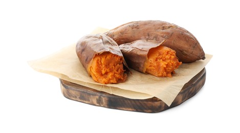 Photo of Tasty cooked sweet potatoes and wooden board isolated on white