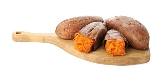 Photo of Tasty cooked sweet potatoes and wooden board isolated on white