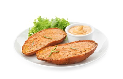 Halves of tasty cooked sweet potato with rosemary, lettuce and sauce isolated on white