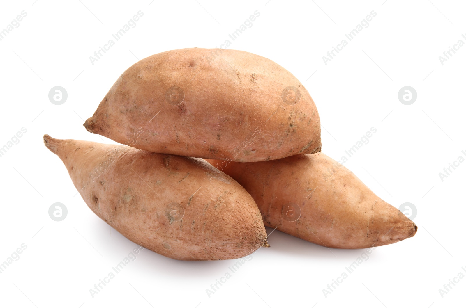 Photo of Fresh raw sweet potatoes isolated on white