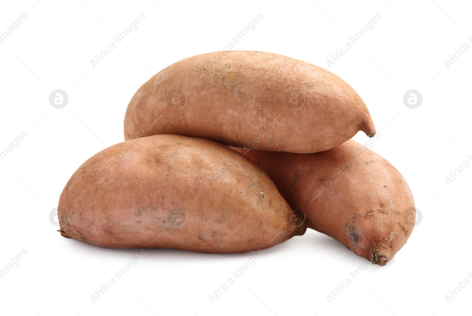 Photo of Fresh raw sweet potatoes isolated on white