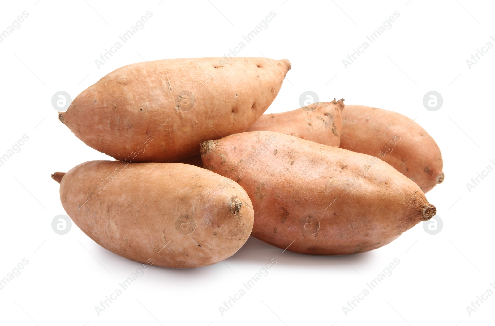 Photo of Fresh raw sweet potatoes isolated on white