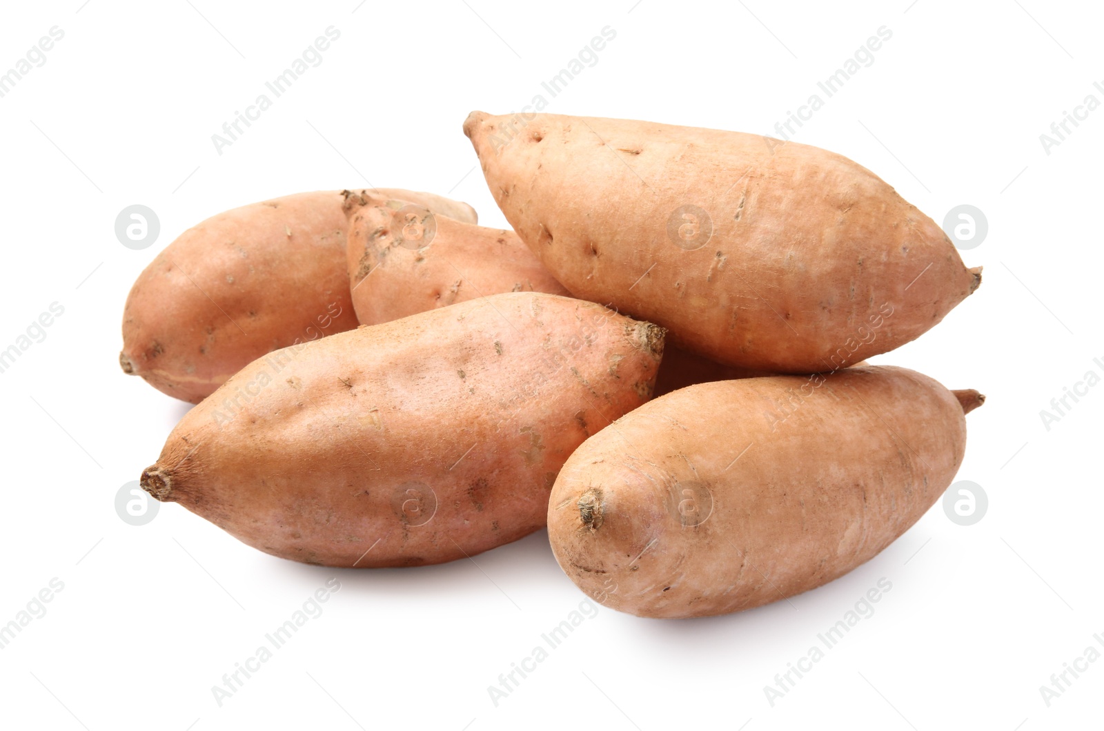 Photo of Fresh raw sweet potatoes isolated on white