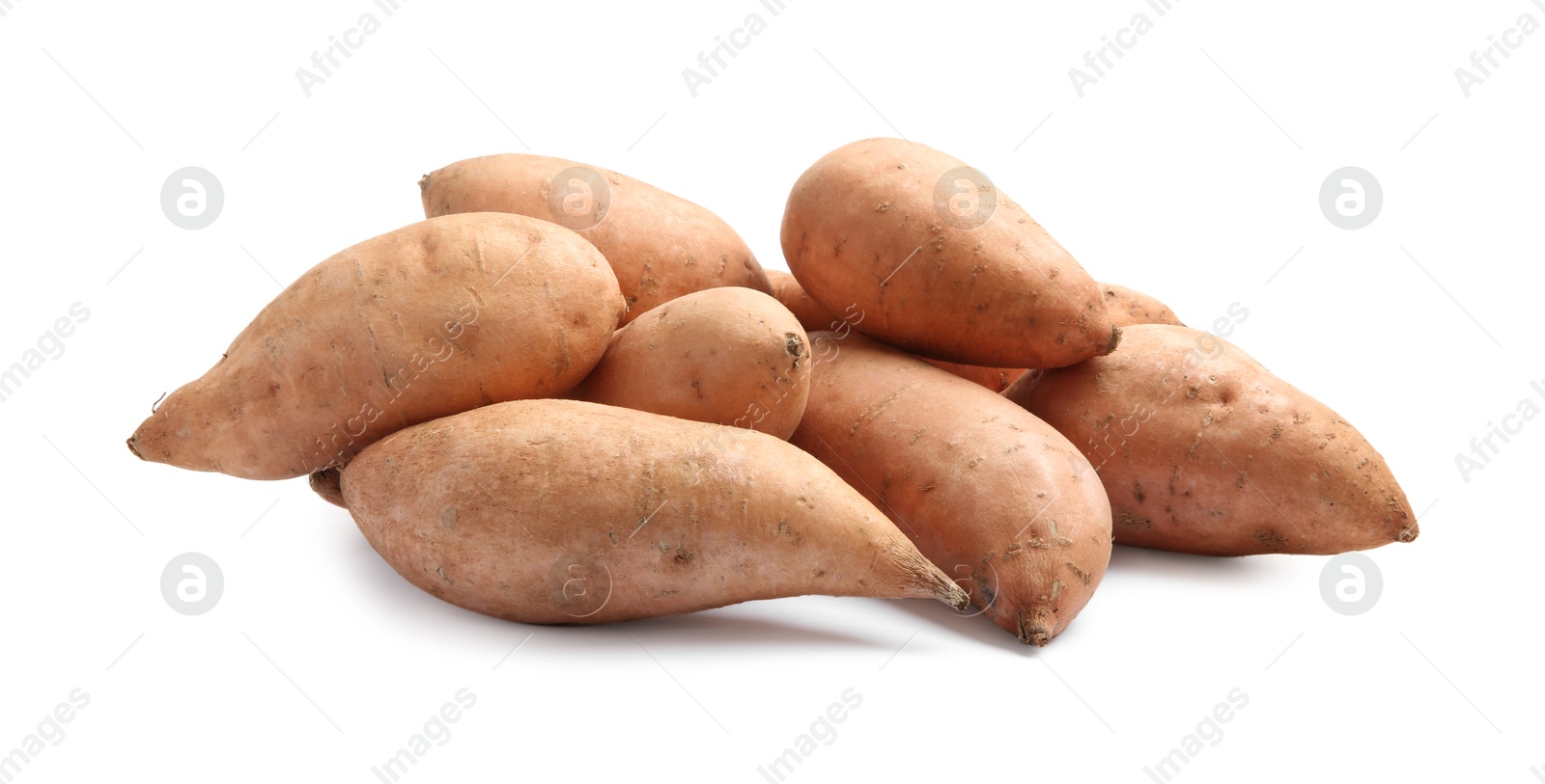 Photo of Fresh raw sweet potatoes isolated on white