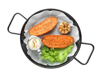 Tasty cooked sweet potato served in baking dish isolated on white, top view